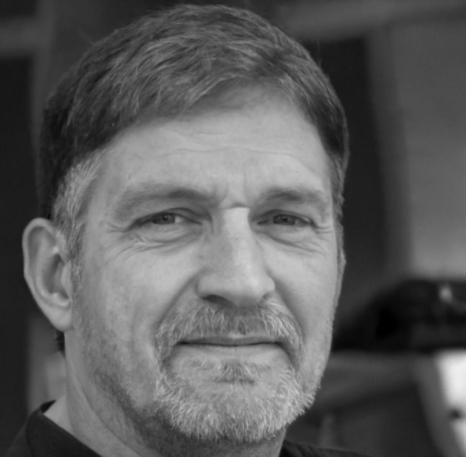 Portrait of Korvash Grimwald, Senior Presentation Strategist